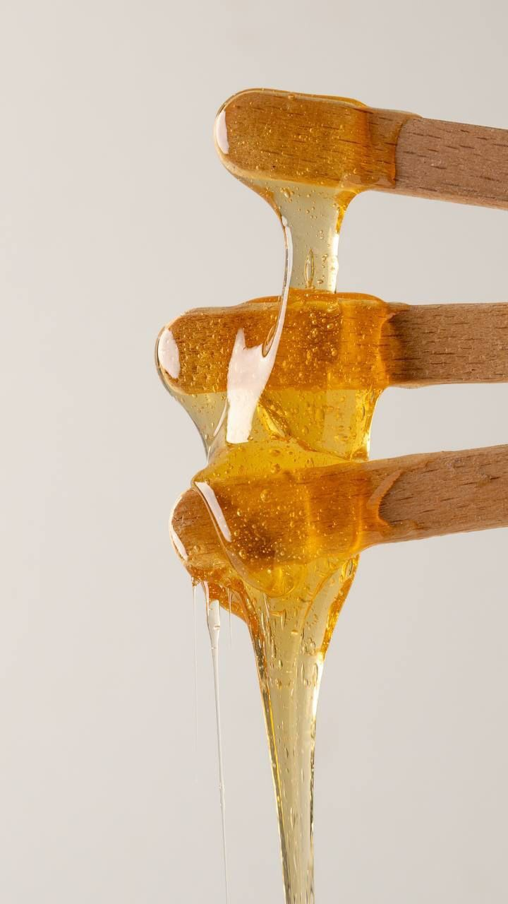 Warm waxing with wooden spatulas at Amor House